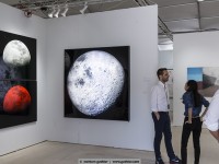 the gallery owners infront of alain richard´s artworks